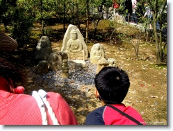 rokuon-ji-coins-1 * The Japanese tradition involves throwing coins for good luck.